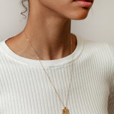 The Kiss Necklace in Gold